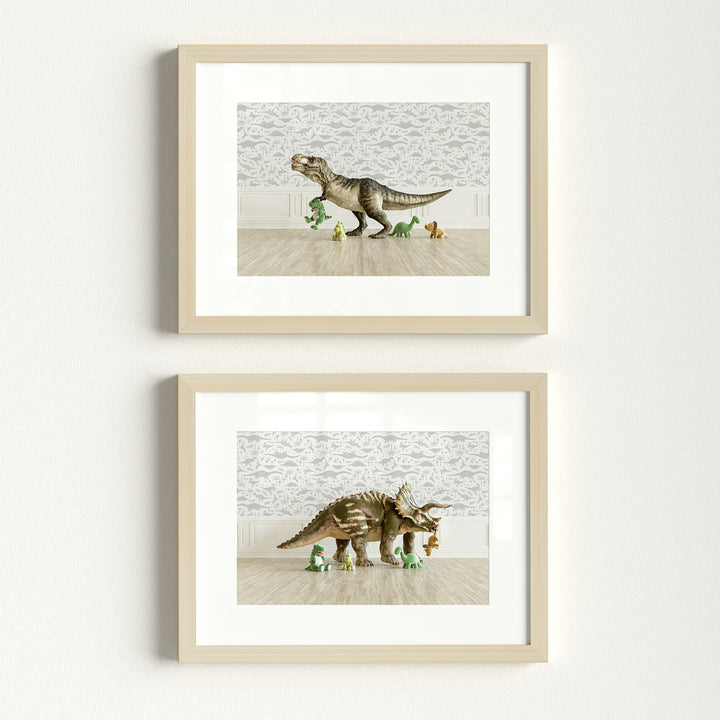 Two framed pictures of dinosaurs on a white wall | The Crown Prints