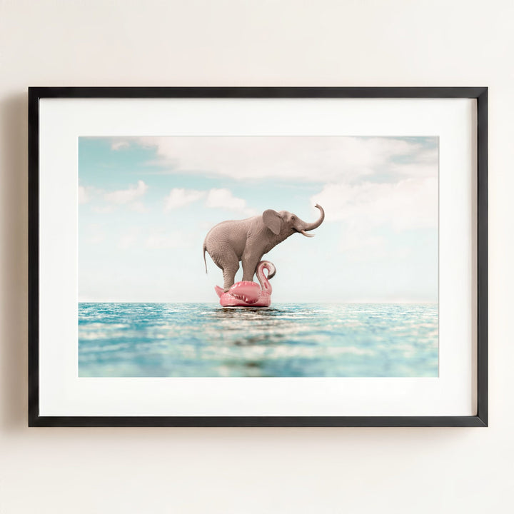 Elephant Afloat a Flamingo