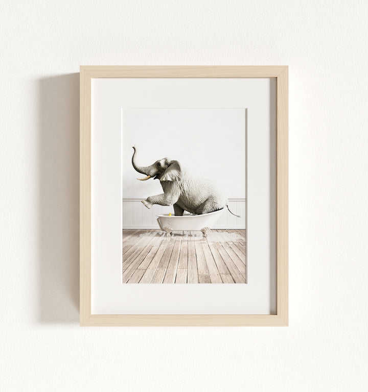 Elephant in White Bathtub Framed Art