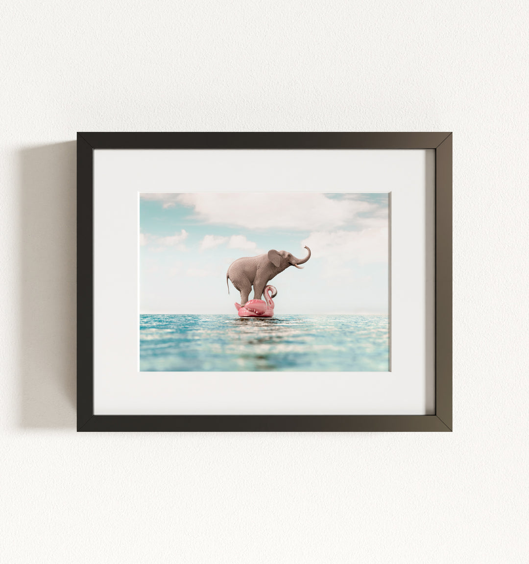 Elephant Afloat a Flamingo Framed Art