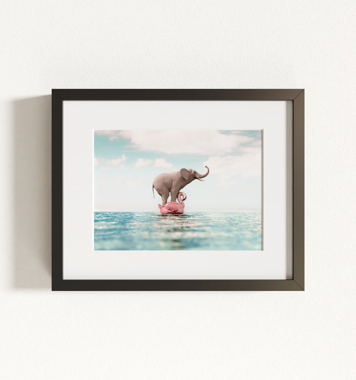 Elephant Afloat a Flamingo Framed Art