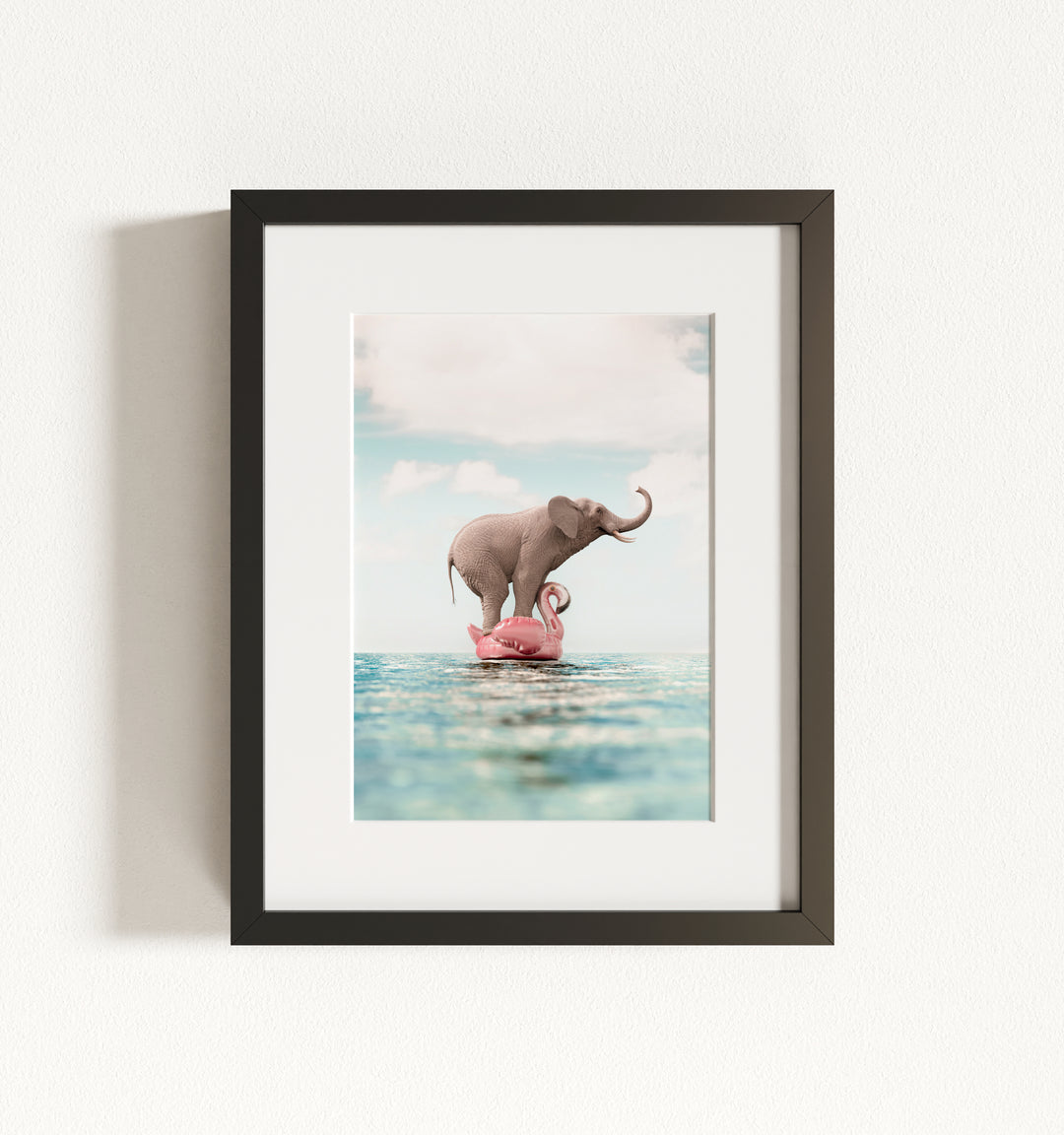 Elephant Afloat a Flamingo Framed Art