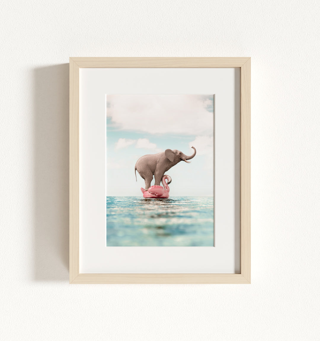 Elephant Afloat a Flamingo Framed Art