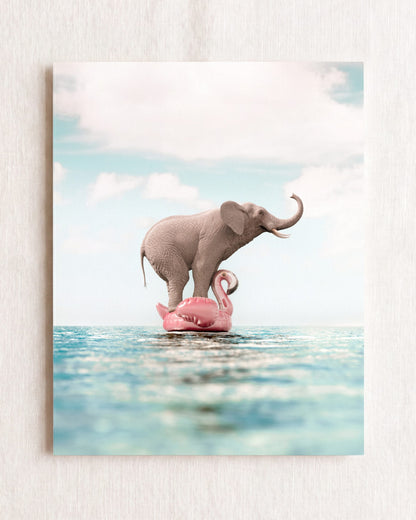 Elephant Afloat a Flamingo
