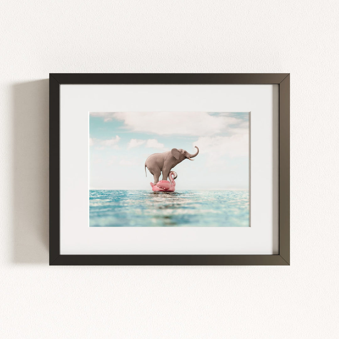 Elephant Afloat a Flamingo