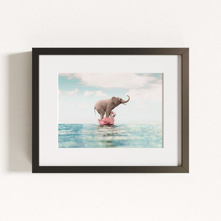 Elephant Afloat a Flamingo